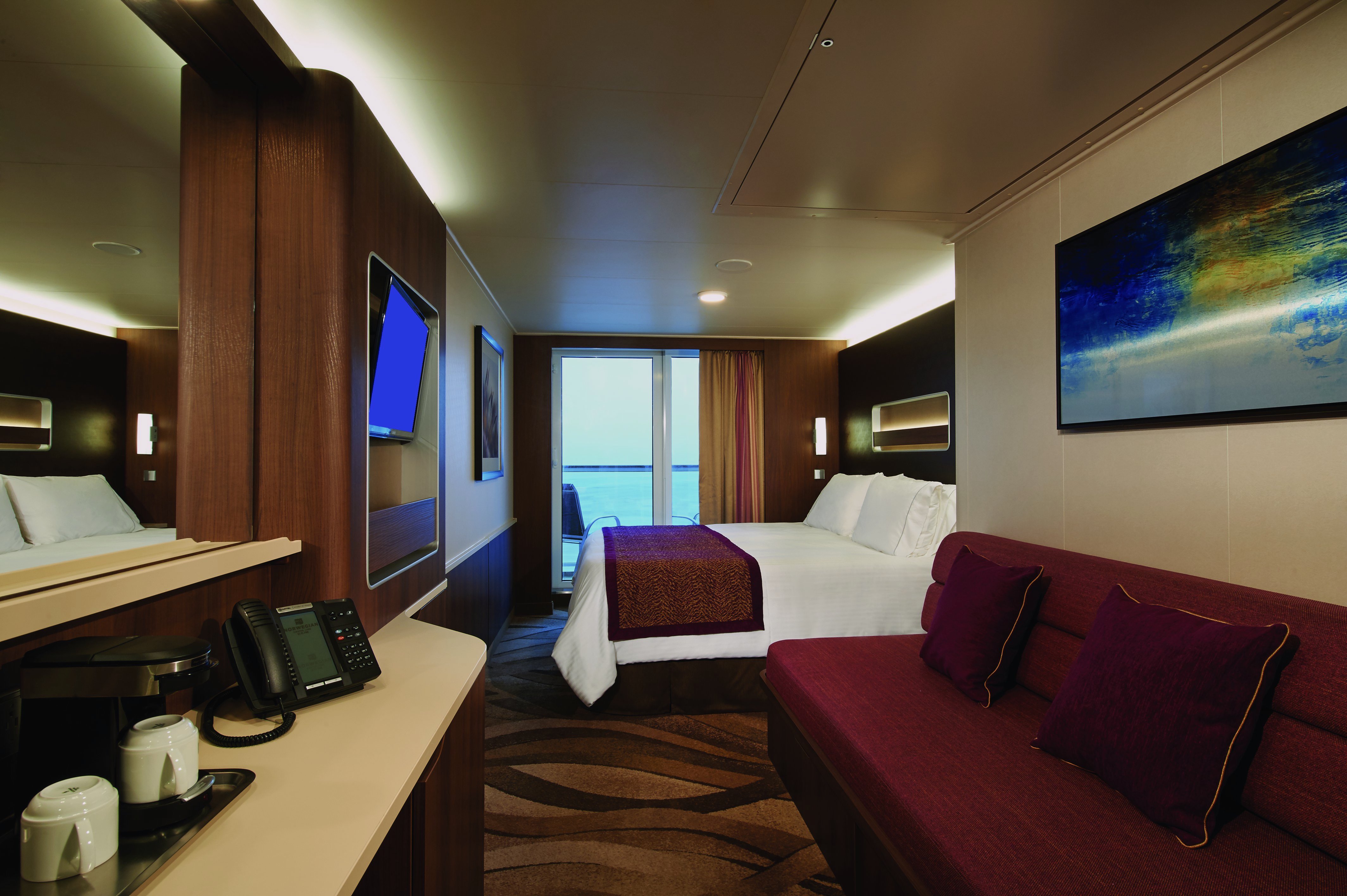 NCL Norwegian Escape Aft-Facing Club Balcony Suite.jpeg