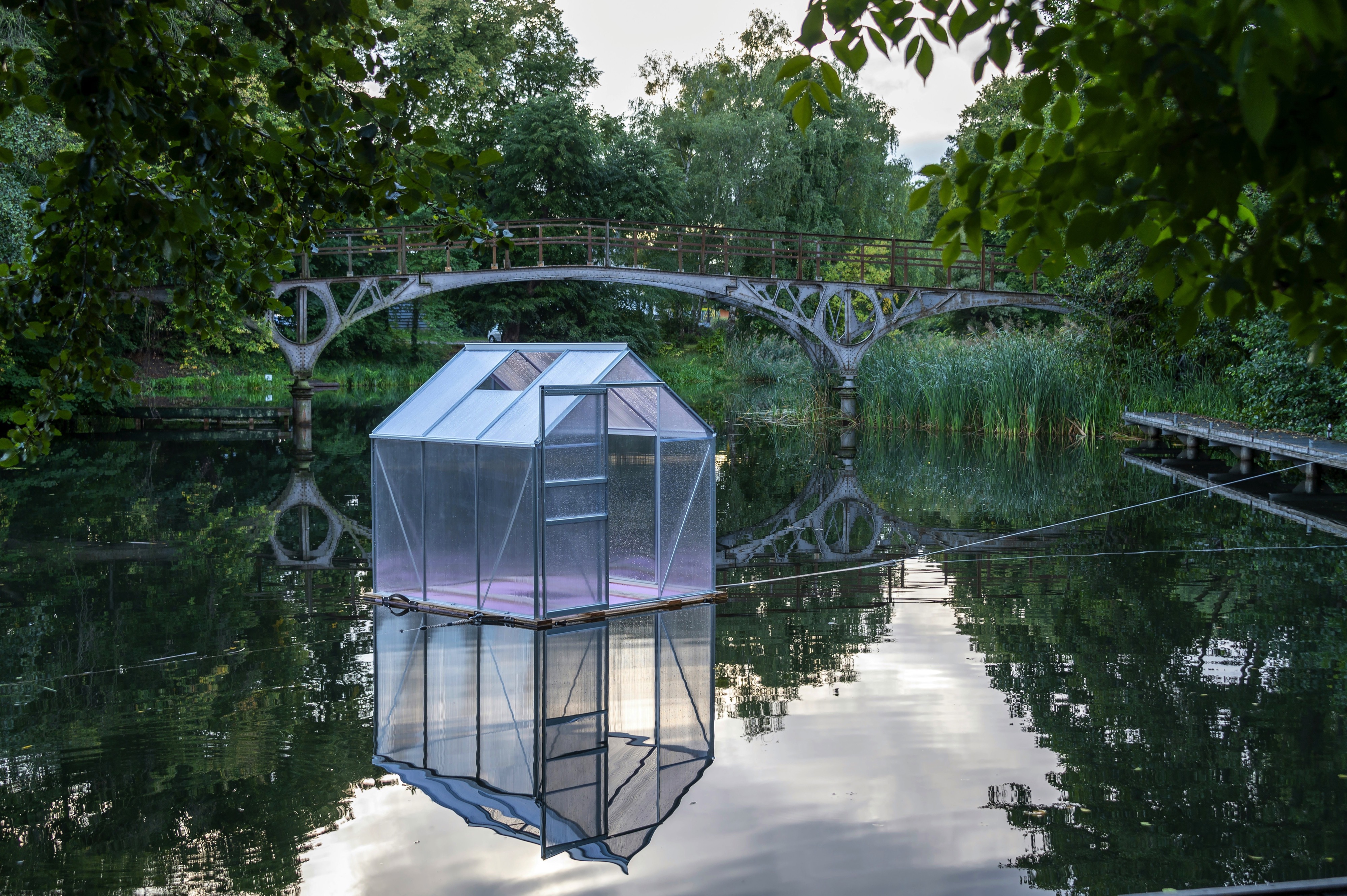 poetic floating house on a clear summer evening