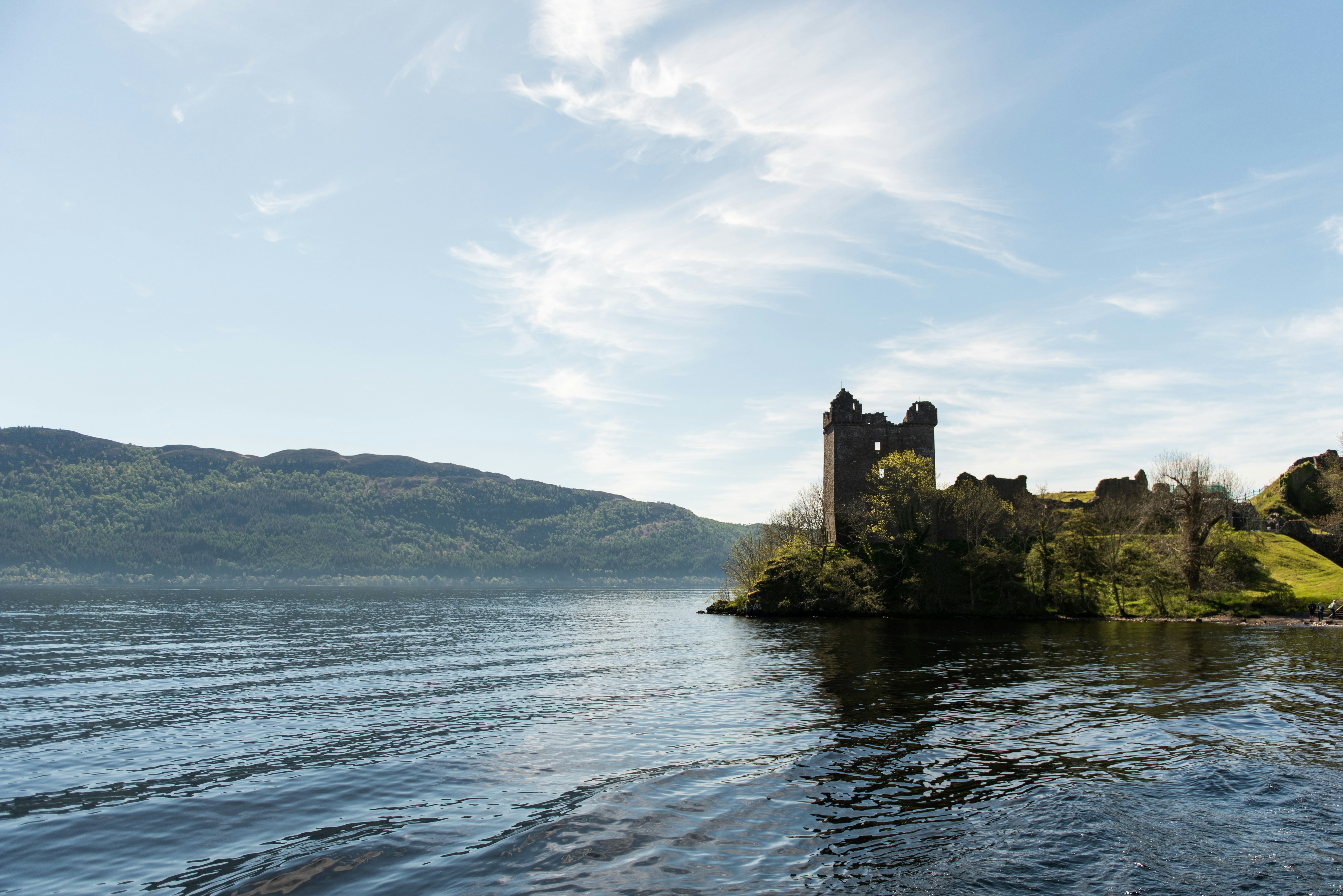Urquhart Castle in Scotland with Loch Ness next to it