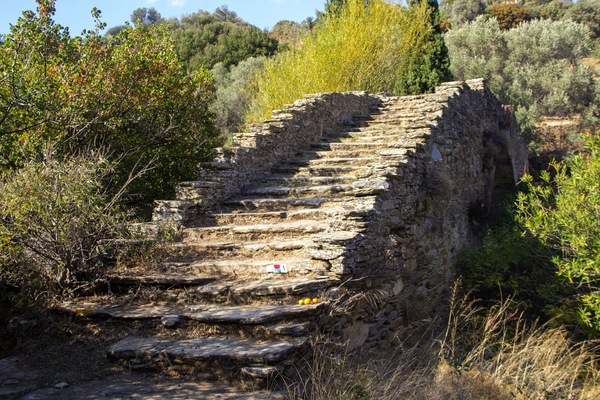 An old crumbling stone bridge