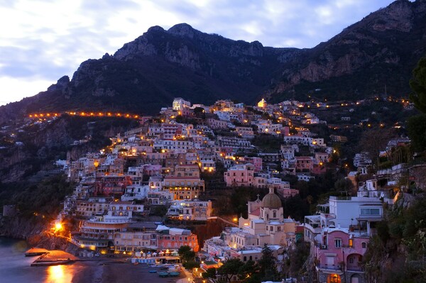 Evening falls on a mountain town, Positano, Italy