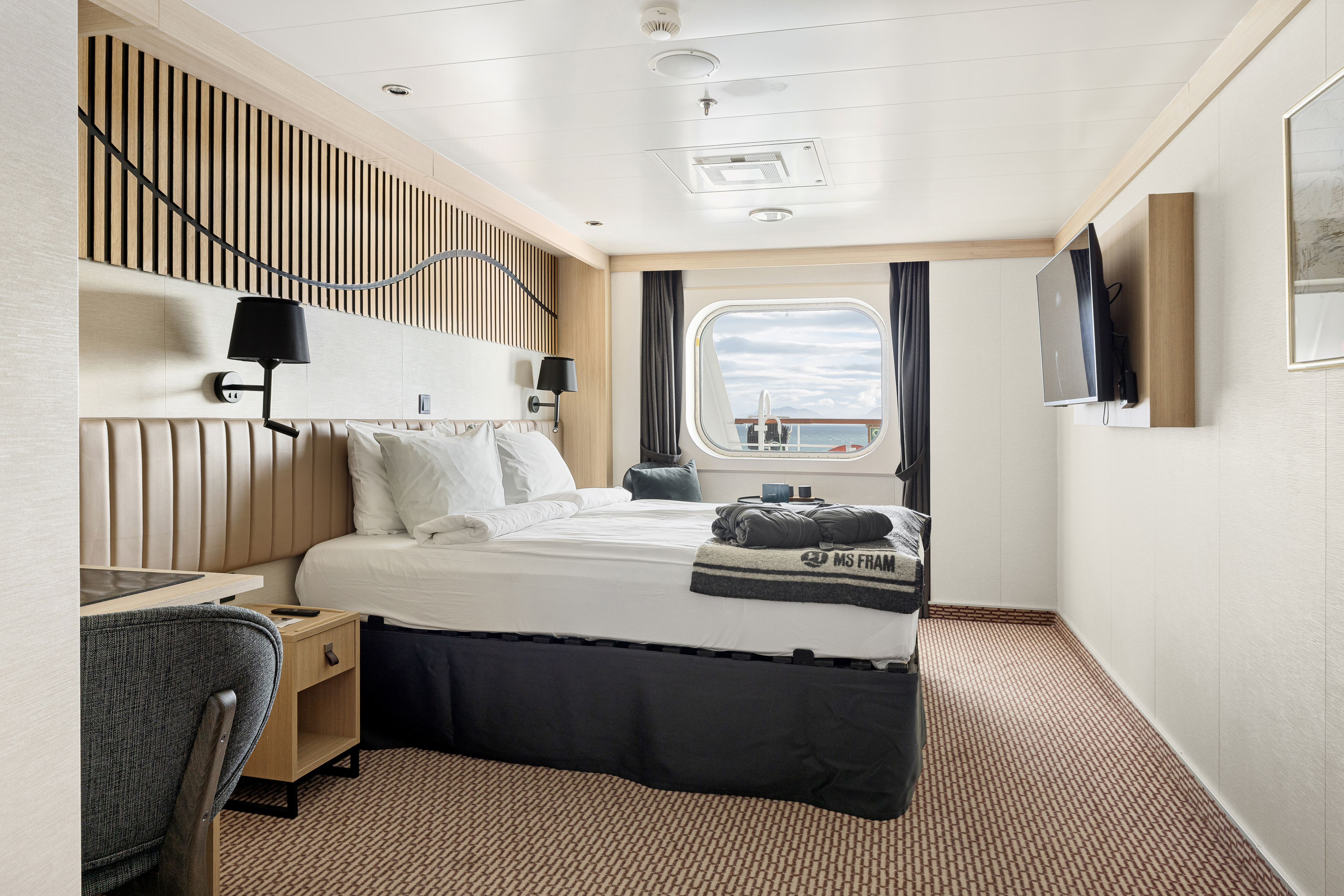 HX Hurtigruten Expeditions MS Fram Arctic Superior Outside Cabin F2 1 ©Espen Mills.jpg