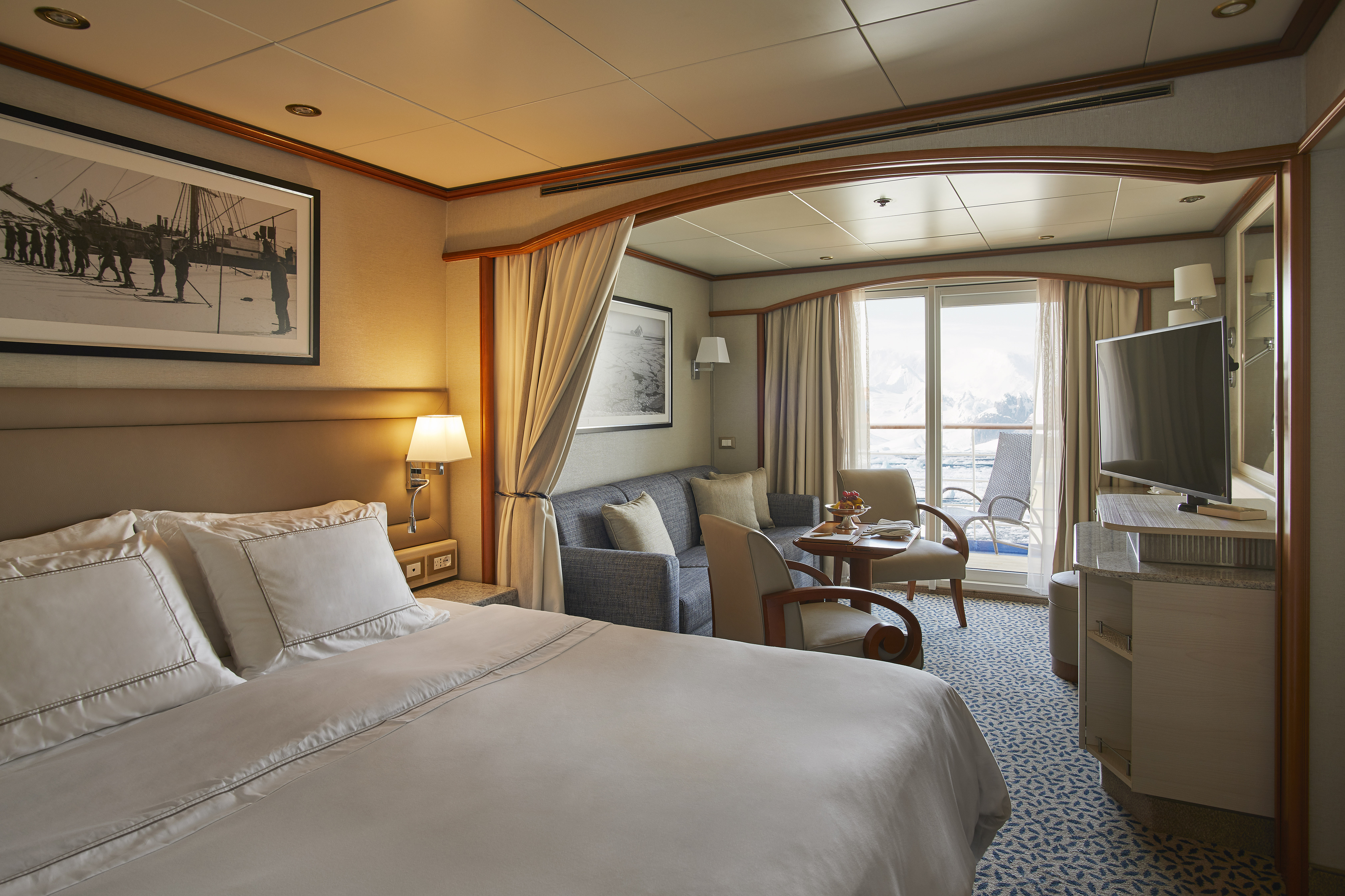 Silversea Cruises Silver Cloud Deluxe Veranda Suite Bedroom and Living Room ©Silversea Cruises Ltd.jpg